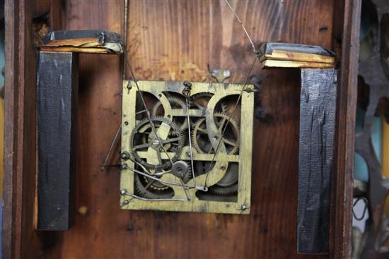 A Black Forest carved cuckoo clock 35in.